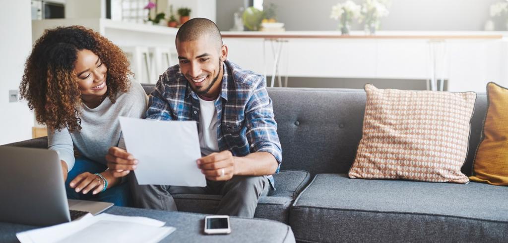 Couple reviewing document