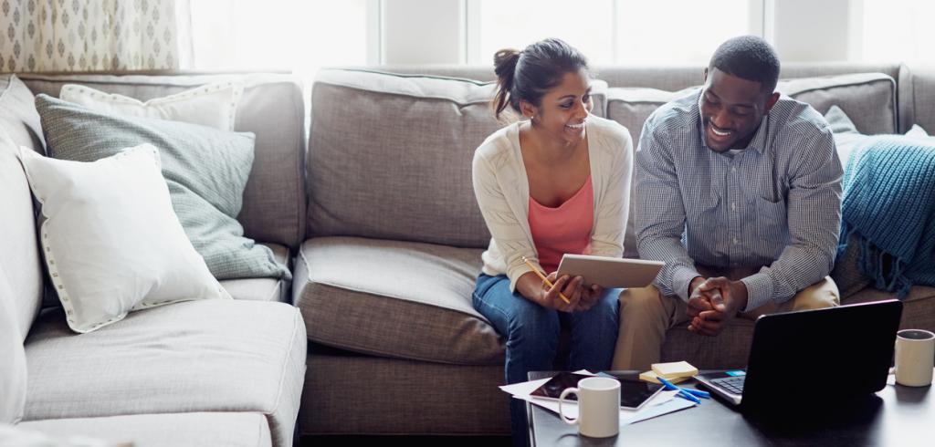 Couple reviewing financial statements Couple reviewing financial statements