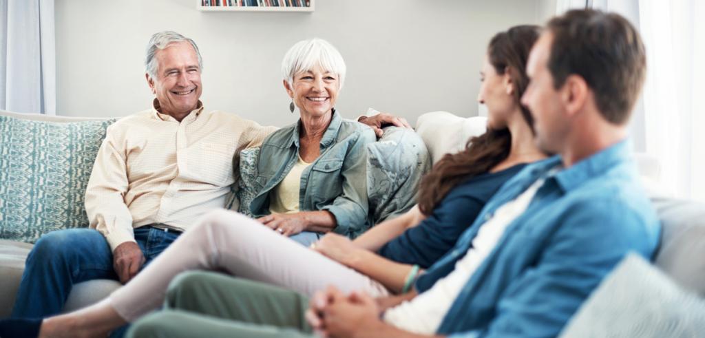 Family in living room Mother, father and their adult children
