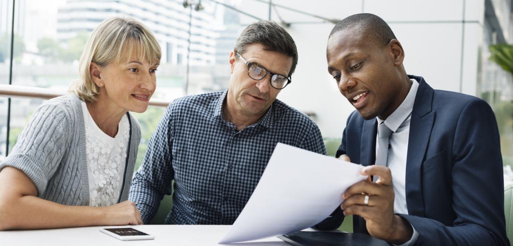 Financial advisor meeting clients Financial advisor meeting clients