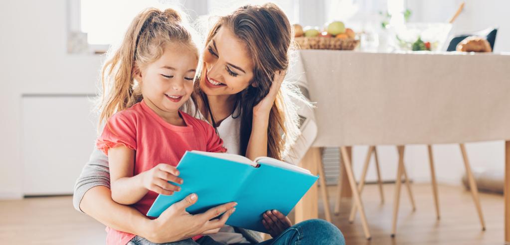 Mother and daughter reading book Mother and daughter reading book