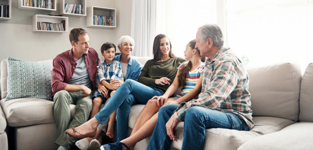 Multi generational family Multi generational family sitting on couch