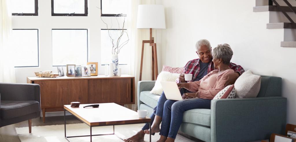 Senior Couple Home Senior couple sitting on couch