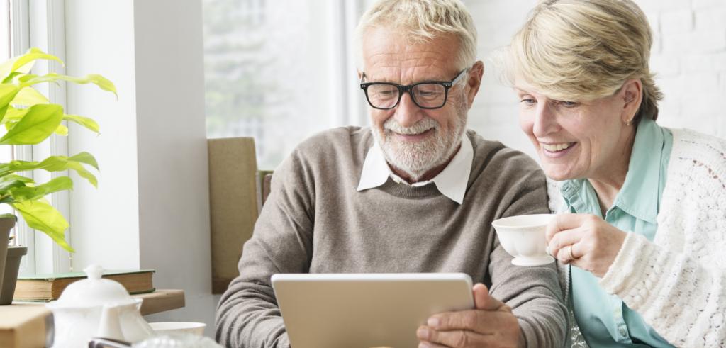 Senior adults using tablet Senior adults using tablet