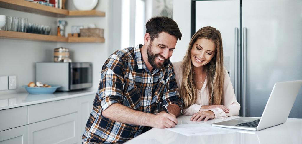 Young couple reviewing documents