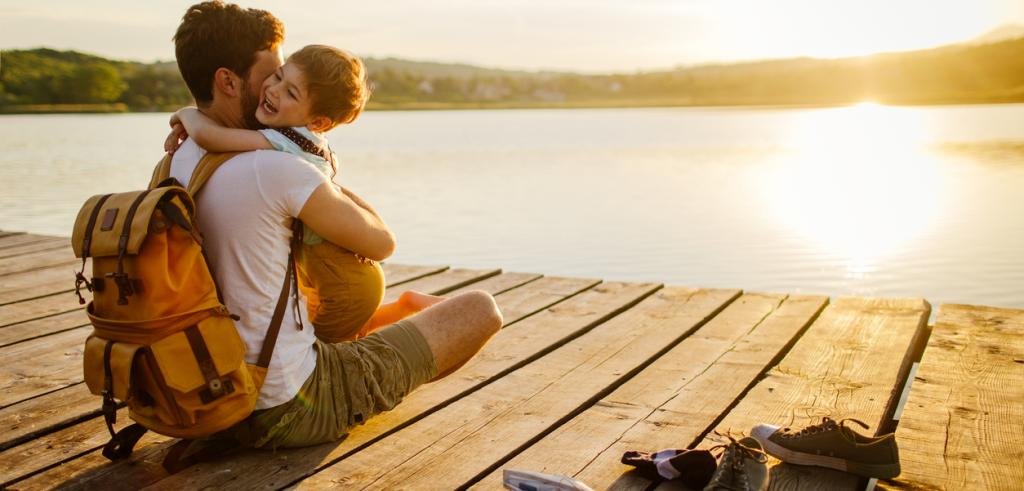 Need to know about Registered Disability Savings Plans? father and son on the lake shore