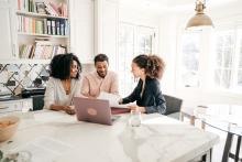 African American couple meeting financial advisor