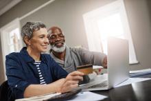Multi ethnic couple working together
