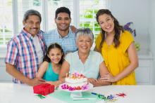 Multigeneration family celebrating birthday