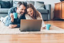 Young couple looking at tablet