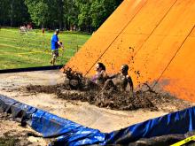Mud slide at Assante Dirty Dash 2018